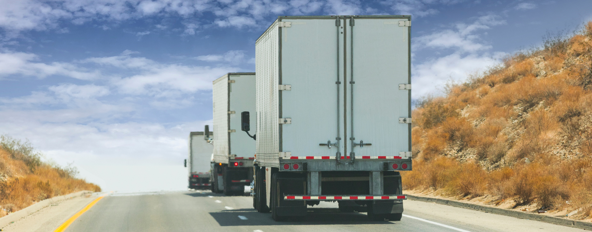 Convoy of trucks on the highway