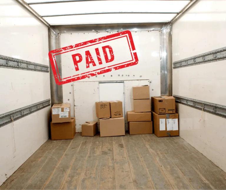 Inside of a box truck with a "paid" stamp on it. Best Factoring Companies for Box Truck Businesses